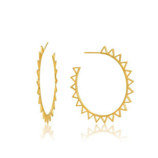 Gold hoop earrings with geometric designs on a white background