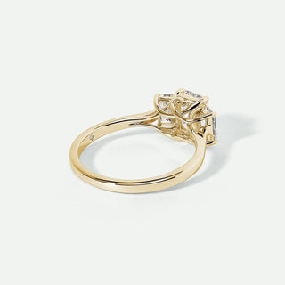 Gold ring with a diamond on a white background