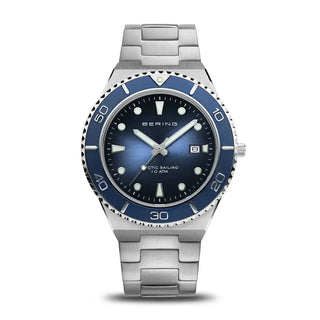 A Bering men's watch with a navy dial and a stainless steel bracelet. The watch has a blue sunray dial with date display, a unidirectional bezel, and luminous hands and indices.