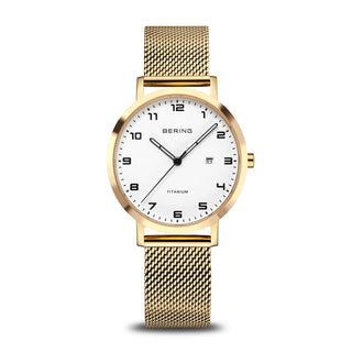 Gold watch with white face on a white background
