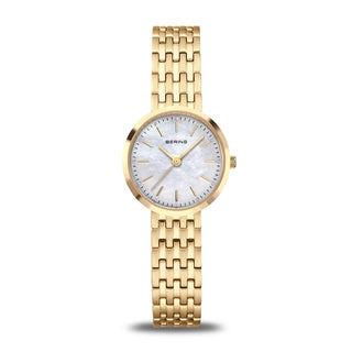 A polished gold Bering ladies classic watch with a white mother-of-pearl dial and a stainless steel bracelet.