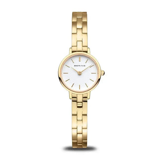 A Bering ladies' gold watch with a white dial and a gold stainless steel bracelet.