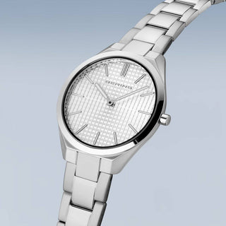 Silver Bering watch on a light gray background