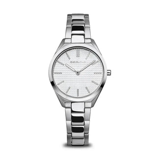 A silver-colored Bering ladies' watch with a round dial, stainless steel strap, and a polished/brushed silver case.