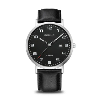 A Bering men's watch with a black dial and a black leather strap, featuring a brushed silver case.