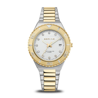 Two-tone watch with gold and silver band on a white background