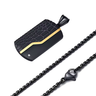 Black textured pendant with gold accent and matching necklace on a white background