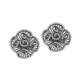 Pair of black floral earrings with intricate design on a white background