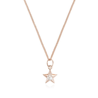 rose gold coloured star shaped necklace with a white pearl in the centre