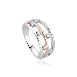 A sterling silver ring with 9ct rose gold accents and white topaz facets, featuring a celestial design.