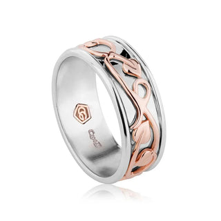 Silver and rose gold ring with a visible brand logo on a white background