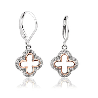 Pair of earrings with rose gold and silver clover design on a white background