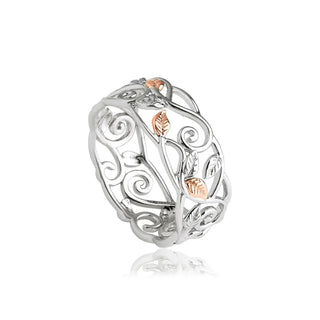 A Clogau Awelon band ring featuring sterling silver with 9ct rose gold leaf detailing.