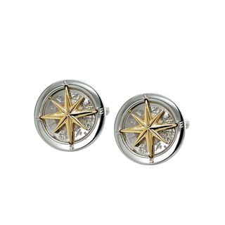 Pair of gold and silver star-shaped compass  cufflinks on a white background