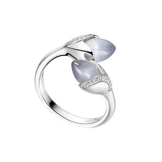 Silver ring with purple gemstones on a white background