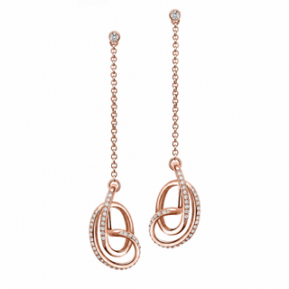 A pair of rose gold dangle earrings with a triple-ring knot design accented by small clear stones, shown against a plain white background.