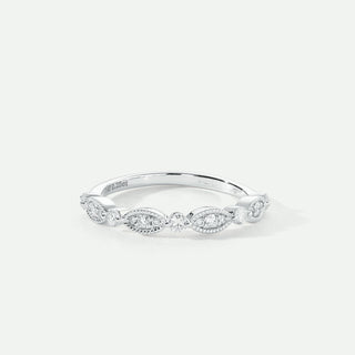 Silver ring with diamonds on a white background