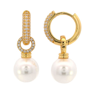 Gold hoop earrings with pearl drops on a white background
