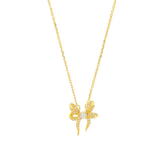 gold necklace with a cz set bow pendant