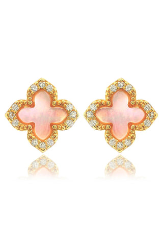 Pair of earrings with pink clover-shaped stones and gold frames on a white background