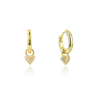 Gold hoop earrings with heart-shaped charms on a white background