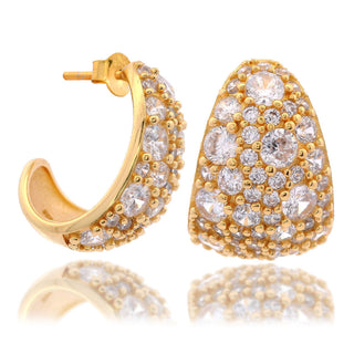 Gold hoop earrings with clear gemstones on a white background