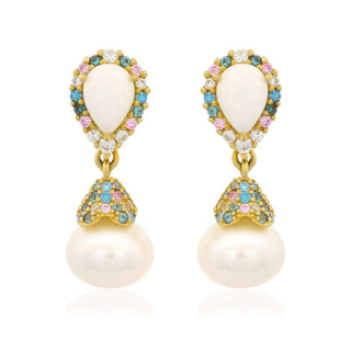 Pair of earrings with white stones and pearl drops on a white background