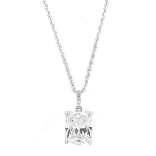 A silver-toned necklace with a rectangular clear gemstone pendant, displayed against a solid white background.