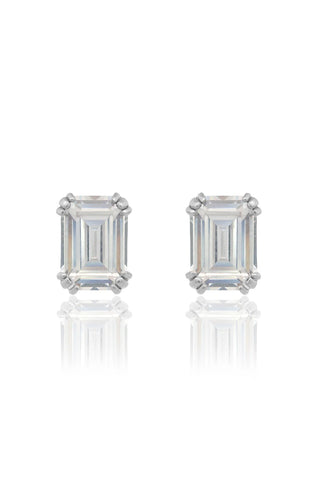 Pair of emerald-cut diamond stud earrings on a white background