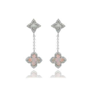 Pair of earrings with star-shaped tops and flower-shaped bottoms on a white background