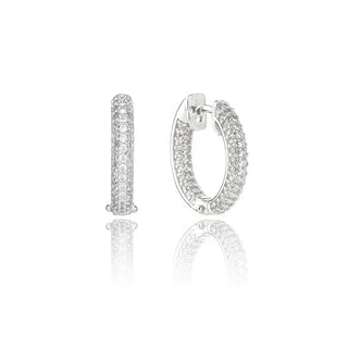 Pair of silver hoop earrings on a white background
