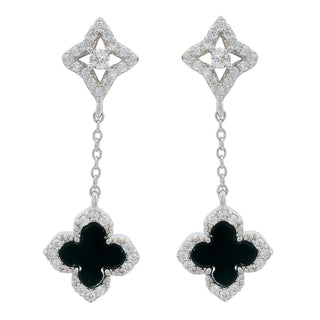 Pair of black clover-shaped earrings with gold accents on a white background