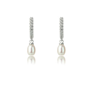 Pair of pearl earrings with diamond accents on a white background