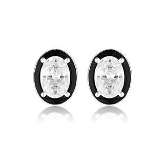 Pair of diamond stud earrings on a white background