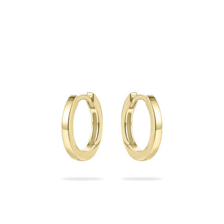 Gold hoop earrings on a white background