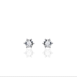 Pair of cubic zirconia stud earrings on a white background