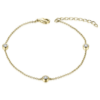 Gold bracelet with cz accents on a white background