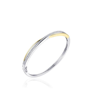 Two-tone silver and gold cz bangle on a white background