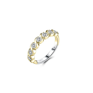 A yellow gold band ring featuring a row of small round clear gemstones in a prong setting, photographed on a clean white background.