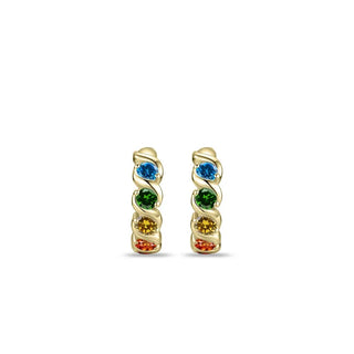 A pair of gold huggie hoop earrings featuring a vertical spiral design set with rainbow gemstones in blue, green, yellow, and red, shown on a plain white background.