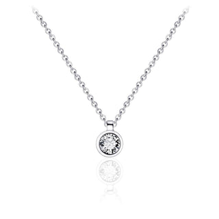 Silver necklace with a round CZ pendant on a white background