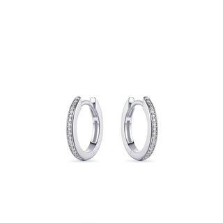 Pair of silver hoop earrings on a white background