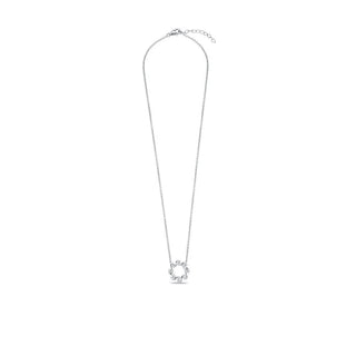 A delicate silver chain necklace with a small openwork circular pendant, displayed against a solid white background.