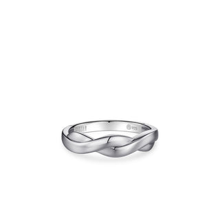 Silver ring with a subtle design on a white background