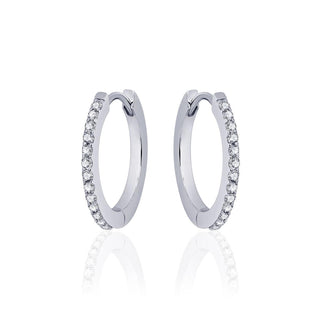 Pair of silver hoop earrings with small diamonds on a white background