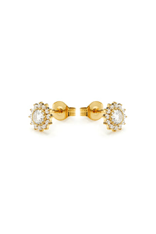Gold earrings with diamond-like stones on a white background
