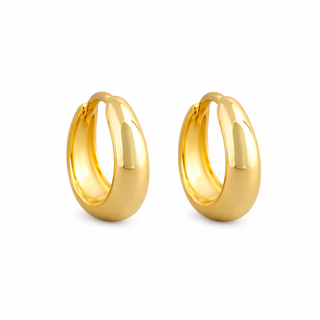 Gold hoop earrings on a white background