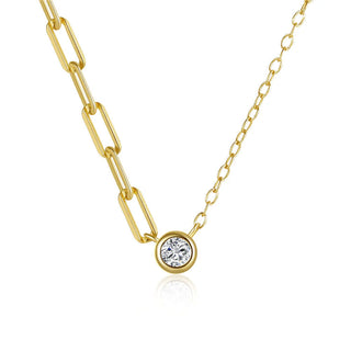 Gold chain necklace with a round diamond pendant on a white background