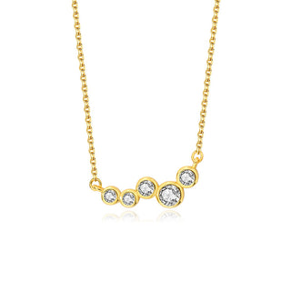 Gold necklace with four circular gemstones on a white background