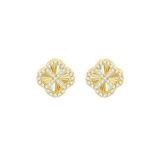 Gold earrings with diamond-like stones on a white background